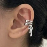 رنگ‌بندی گوشواره زنانه ایرکاف مدل پاپیون طلایی و نقره‌ای در فینگیل شاپ